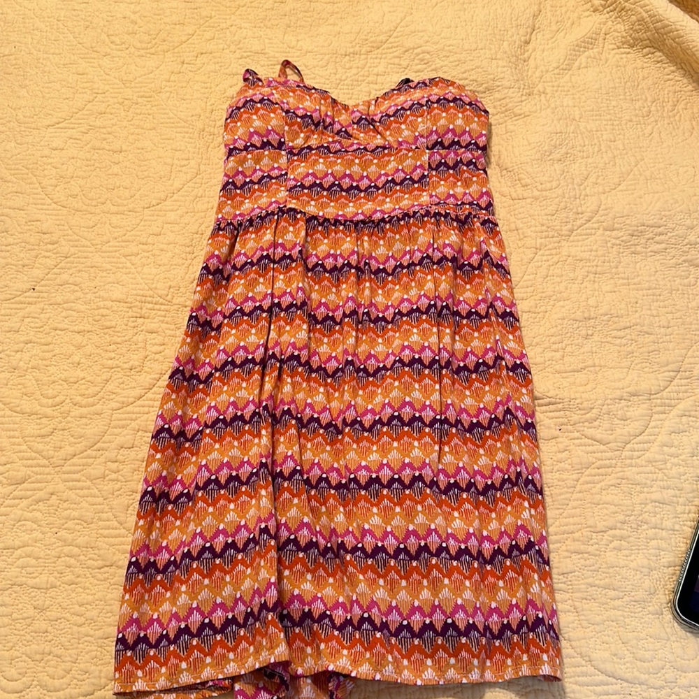 Multicolor girls dress. Has cups with little pads in it, with spaghetti straps.